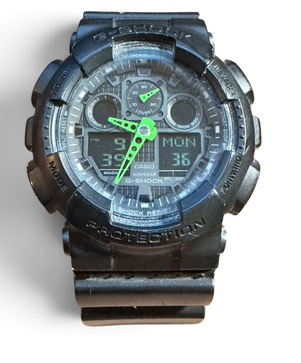 Casio G-Shock GA100C Black Green Digital Watch, Shock Resistant, Stylish